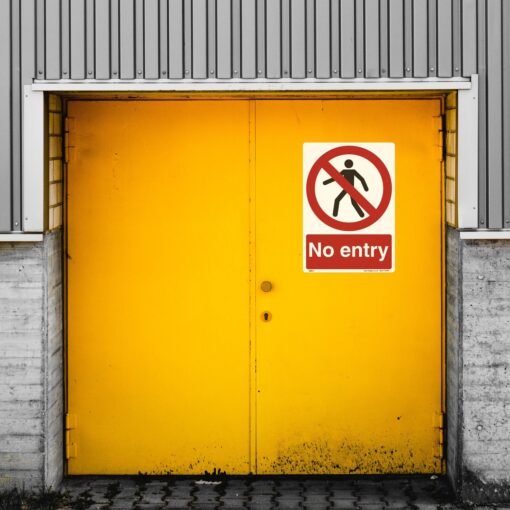ML017 No Entry Sign on an industrial door.